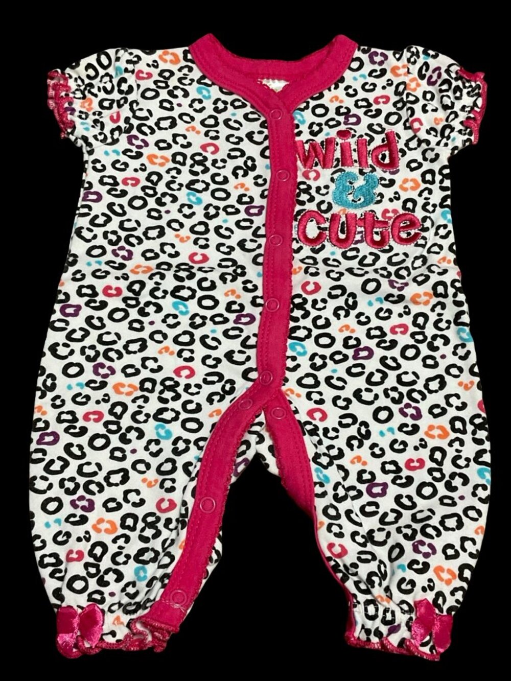 Multicolored Leopard Print "Wild & Cute" Romper w/ Bow Details